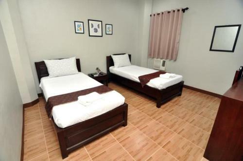 Posada Harbour Gardens Tourist Inn