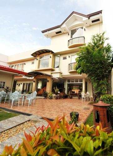 Posada Harbour Gardens Tourist Inn