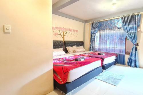 Hotel Kamuna Garden 2 Sidebuk Debuk