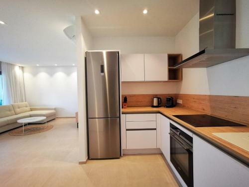 Brand New (2022) Apartment Surrounded By Tropical Gardens!