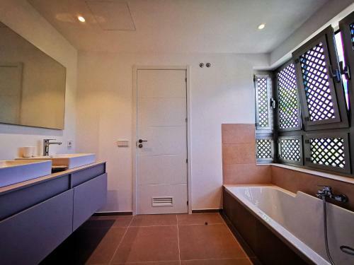 Brand New (2022) Apartment Surrounded By Tropical Gardens!