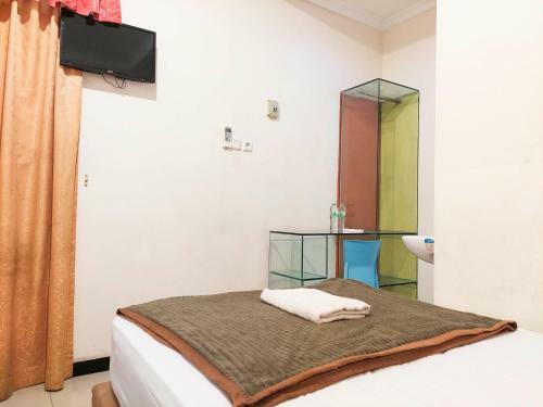Apartamento Djuragan Kamar Tiara