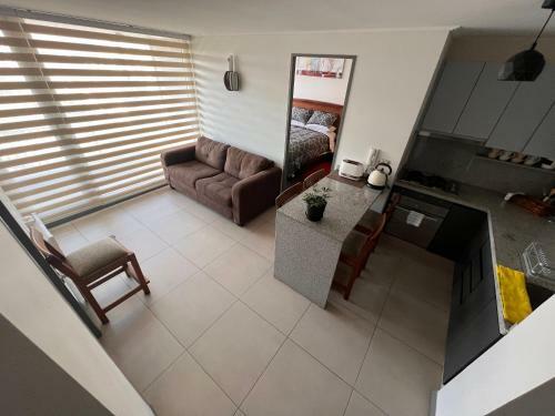 Apartamento Departamento Ejecutivo En Edificio Chacabuco, Amoblado 2d+2b, Estacionamiento.