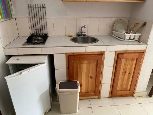 Hostal Queen Zee Garden Apartments