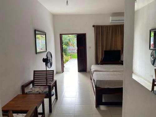 Hostal Queen Zee Garden Apartments
