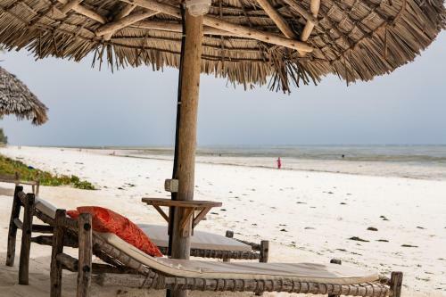 Kima Serviced Beach House & Suites