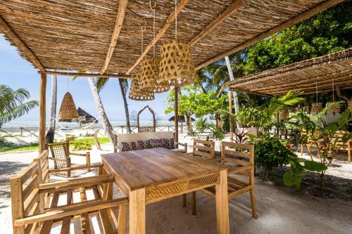 Kima Serviced Beach House & Suites