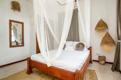 Kima Serviced Beach House & Suites