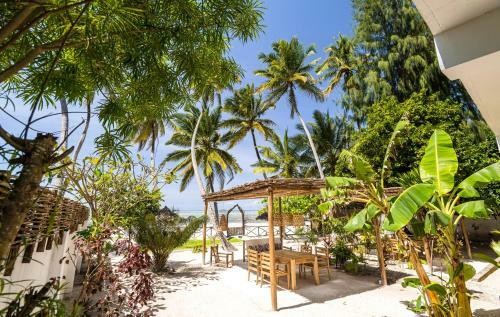 Kima Serviced Beach House & Suites