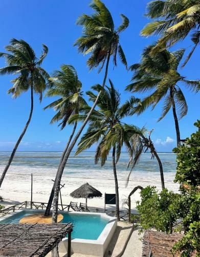 Kima Serviced Beach House & Suites