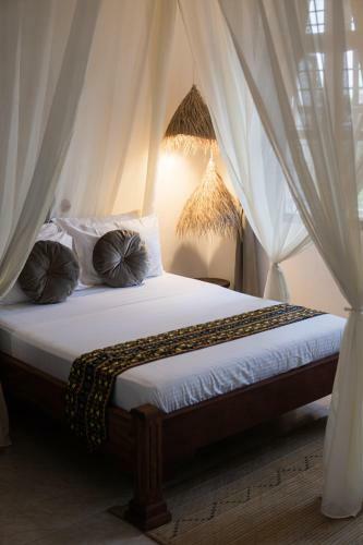 Kima Serviced Beach House & Suites