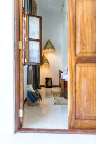 Kima Serviced Beach House & Suites