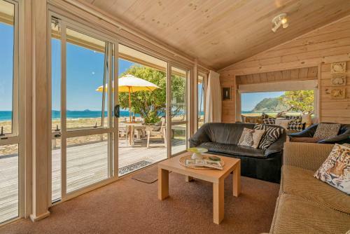 Absolute Beachfront Bach - Pauanui Holiday Home