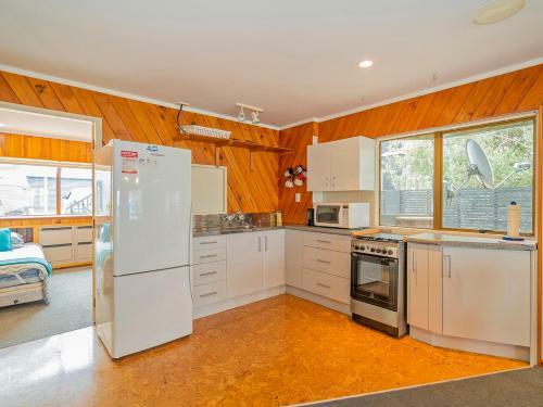 Beachfront Beauty - Opito Bay Holiday Home
