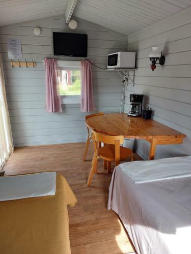 Uttis Home Cottages & Camping
