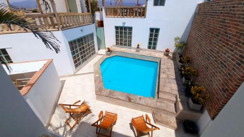 Visi�n Inmobiliaria Guest House Concept
