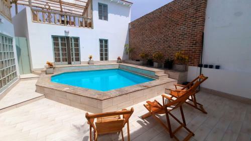 Visi�n Inmobiliaria Guest House Concept