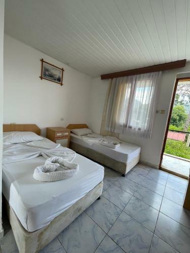 ?psos Hotel Beld?b?