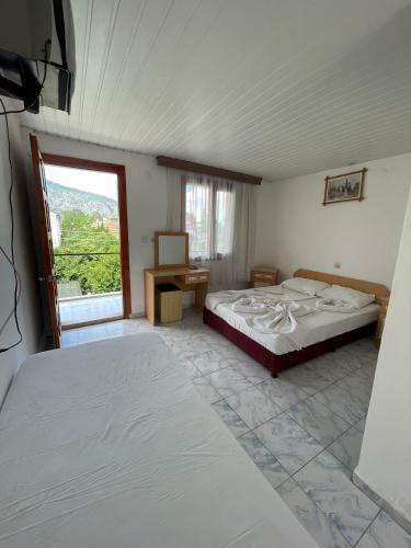 ?psos Hotel Beld?b?