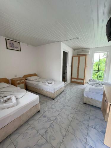 ?psos Hotel Beld?b?