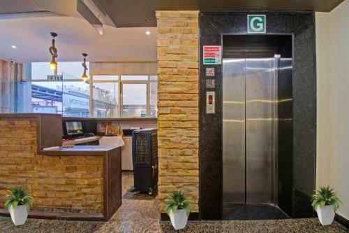 Capital O 91036 Hotel Stanza