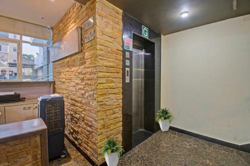 Capital O 91036 Hotel Stanza