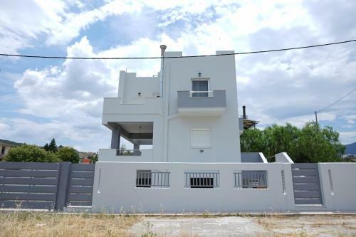 Single House By The Sea