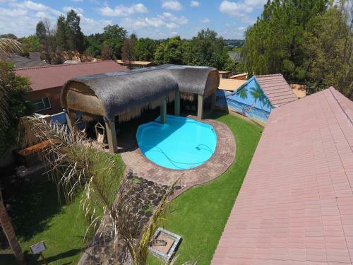 The Log Cabin Apartments Hotel