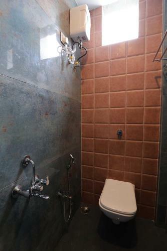 Oyo 90399 Pramila Prakash Hotel
