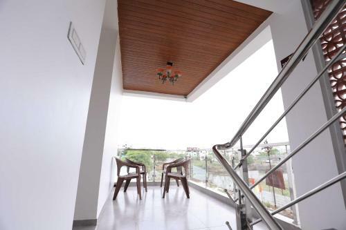 Oyo 90399 Pramila Prakash Hotel