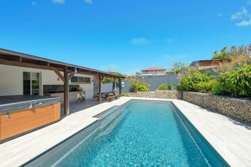 Honeysuckle Beachfront Home With Pool