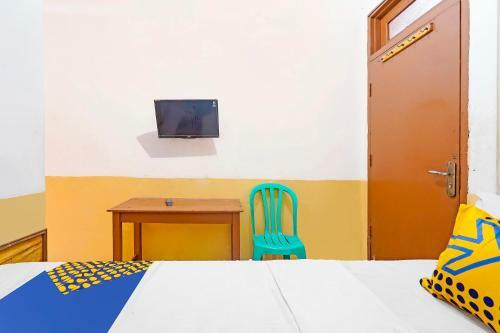 Spot On 91444 Hotel Arimbi