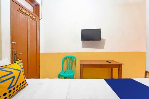Spot On 91444 Hotel Arimbi