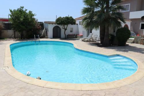 Apartamento Mediterranean Poolside Garden Cottage
