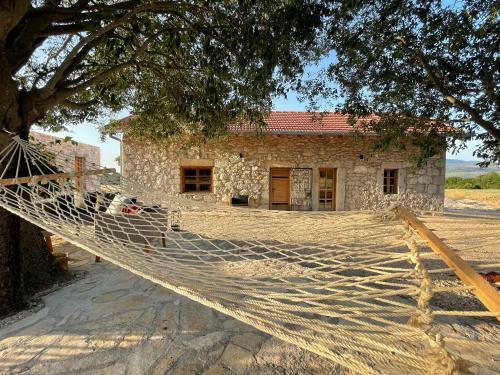 Kostela Stone House