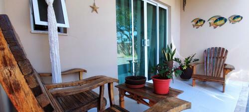 Casa Na Orla, Massagu�u