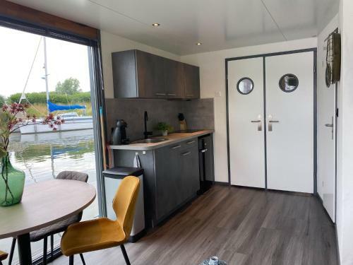 Modern House Boat In Monnickendam With Jetty