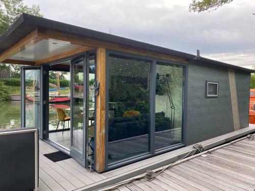 Modern House Boat In Monnickendam With Jetty