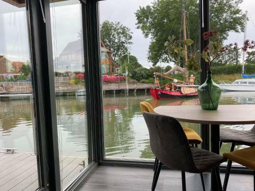Modern House Boat In Monnickendam With Jetty