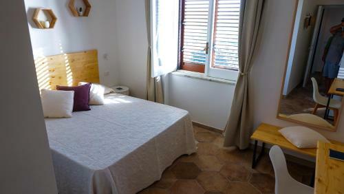 Hostal Castellabate Apartments Camere
