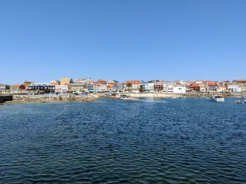 Precioso Apartamento En Corrubedo Con Terraza Y Garaje Propios