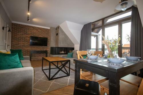 Apartamenty Pod Kominkiem