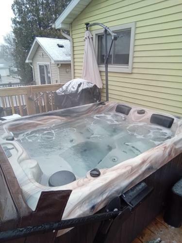 Outdoor Hot Tub And Cozy King Bed