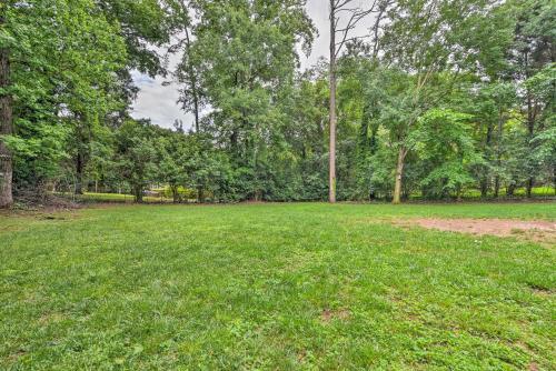 Charming Charlotte Cottage On A Half Acre!