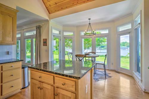 Elegant Waterfront Home With Bar, Deck And Views!