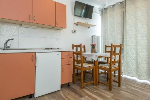 Apartmani Grmoja
