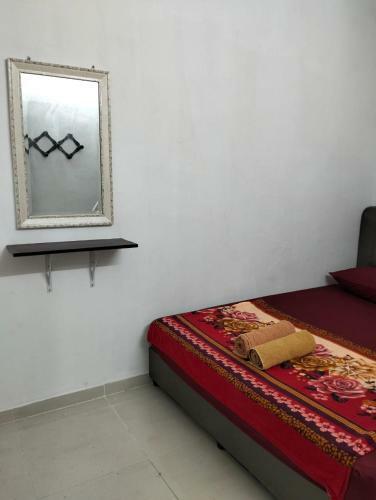 Apartamento Mahsuri Homestay