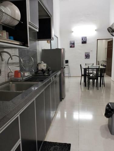 Apartamento Mahsuri Homestay