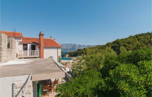 Nice Home In Povlja With Wifi And 2 Bedrooms