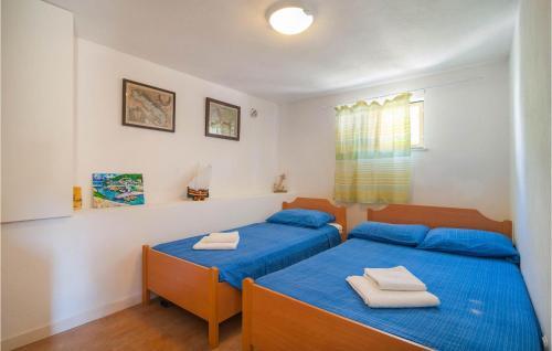Nice Home In Povlja With Wifi And 2 Bedrooms